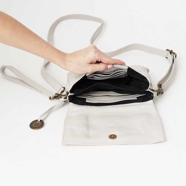 The Siena crossbody clutch The Wanderers Travel Co